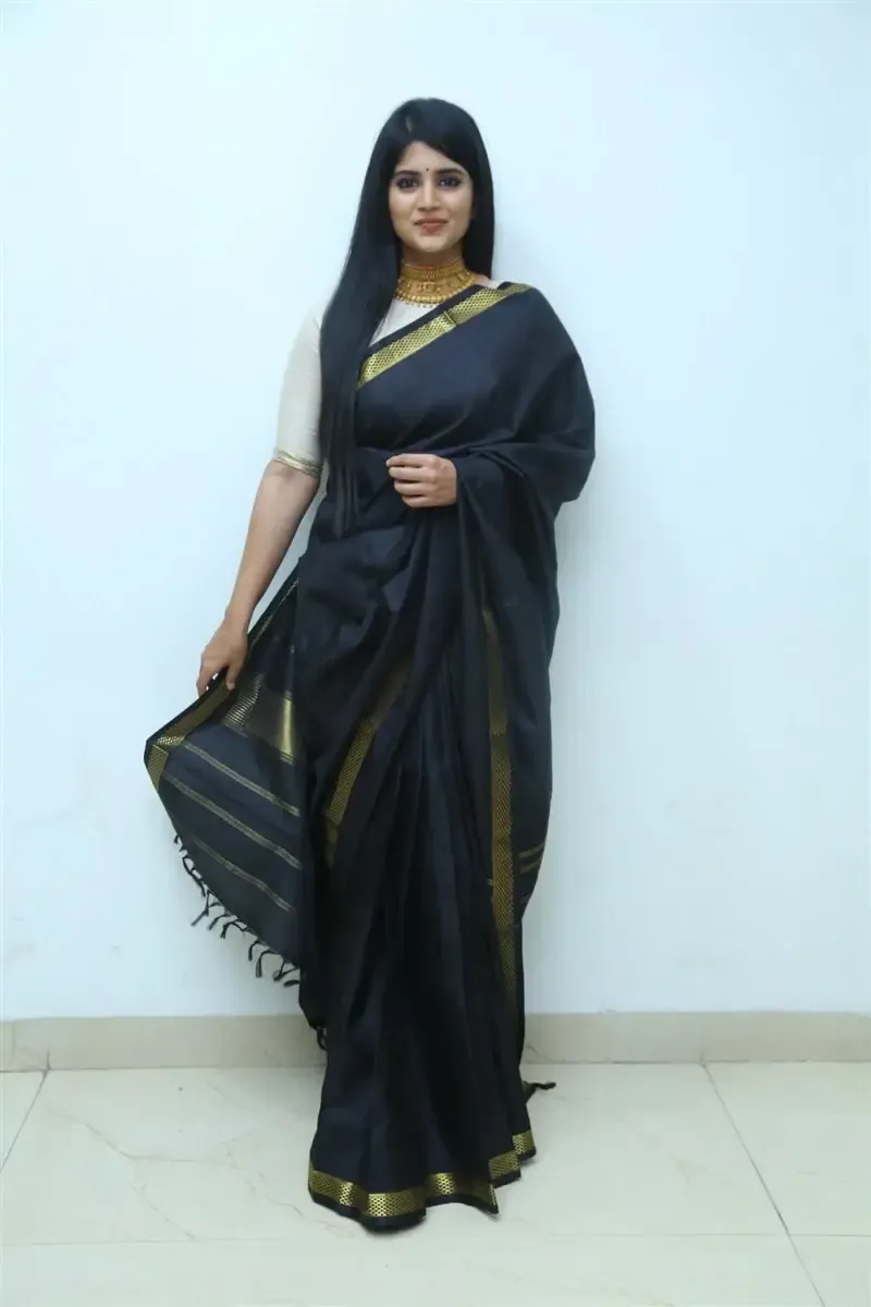 Megha Akash in Black Saree at Manu Charitra Telugu Movie Trailer Launch